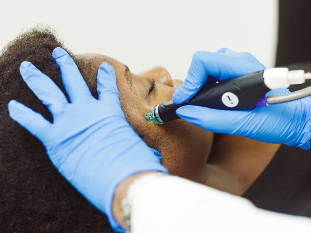 In-clinic facial treatment addressing dryness and collagen loss from menopause skin changes.